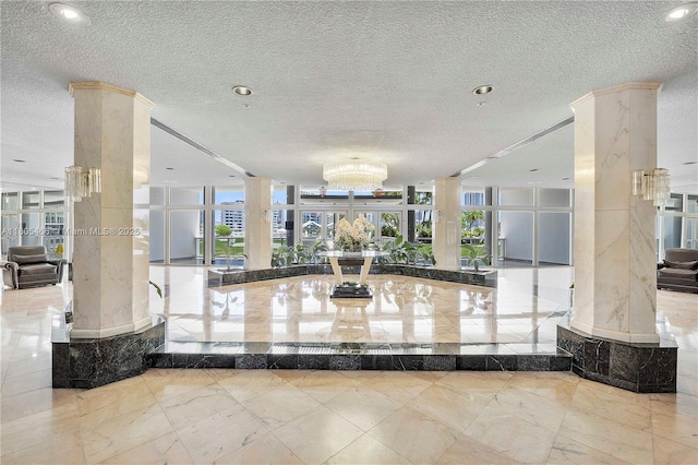 900 Bay Dr Unit 210, Miami Beach, FL 33141 - building lobby with a textured ceiling and recessed lighting