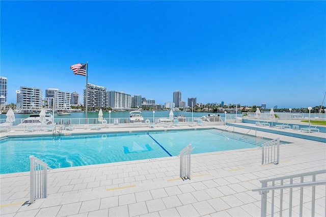 900 Bay Dr Unit 210, Miami Beach, FL 33141 - community pool featuring a skyline view