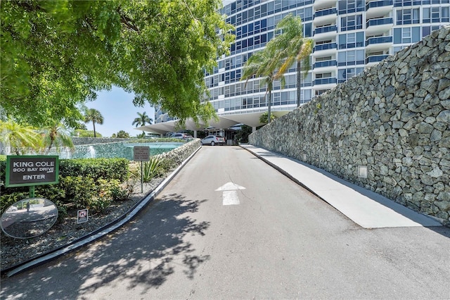 900 Bay Dr Unit 210, Miami Beach, FL 33141 - view of asphalt road featuring curbs