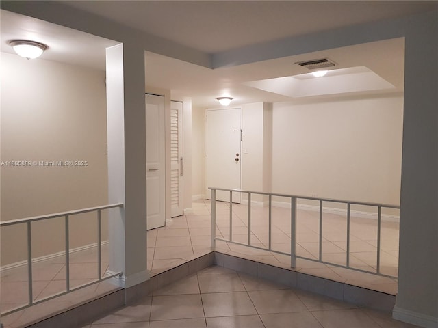 3730 Inverrary Dr Unit 2N, Lauderhill, FL 33319 - hall with tile patterned flooring and a raised ceiling