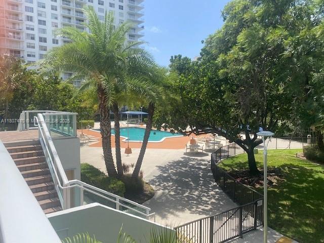 2801 NE 183rd St Unit 1011W, Aventura, FL 33160 - surrounding community featuring a pool and a patio area