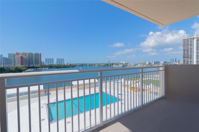 250 174th St Unit 601, Sunny Isles Beach, FL 33160 - balcony with a city view, view of pool area, and a water view