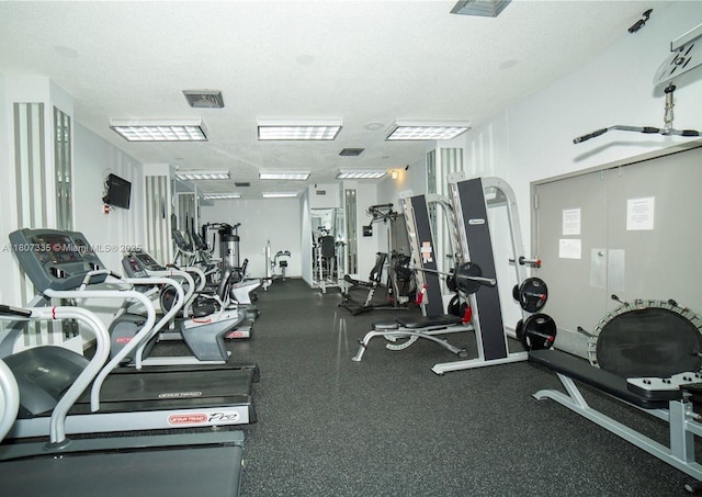 250 174th St Unit 601, Sunny Isles Beach, FL 33160 - workout area featuring a textured ceiling