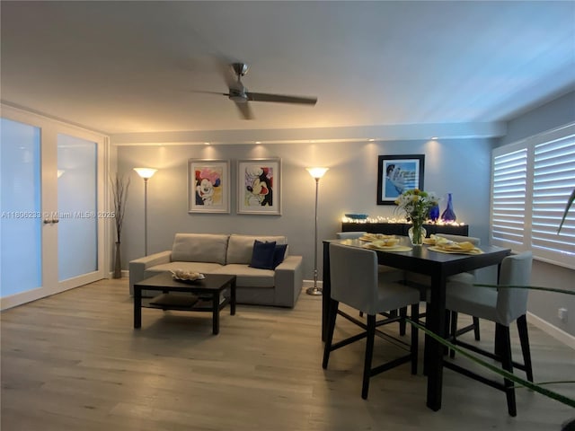 535 Hendricks Isle Unit 303, Fort Lauderdale, FL 33301 - dining space with ceiling fan, light wood-type flooring, and baseboards