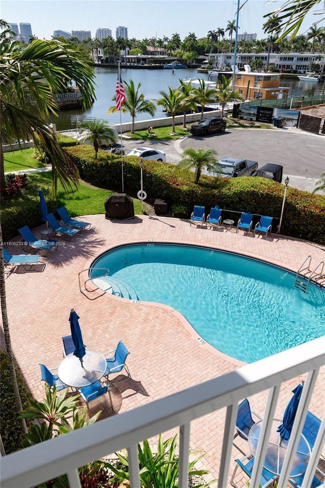 535 Hendricks Isle Unit 303, Fort Lauderdale, FL 33301 - community pool featuring a water view and a patio area