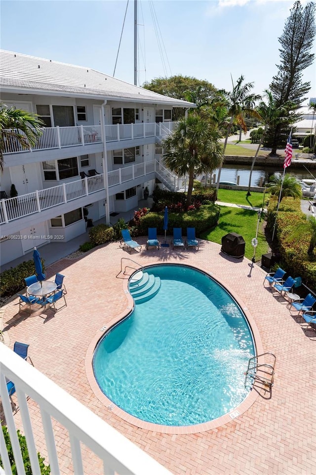 535 Hendricks Isle Unit 303, Fort Lauderdale, FL 33301 - community pool featuring a patio and a water view