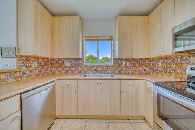 9018 SW 211th Ln, Cutler Bay, FL 33189 - kitchen featuring stainless steel appliances and light brown cabinets