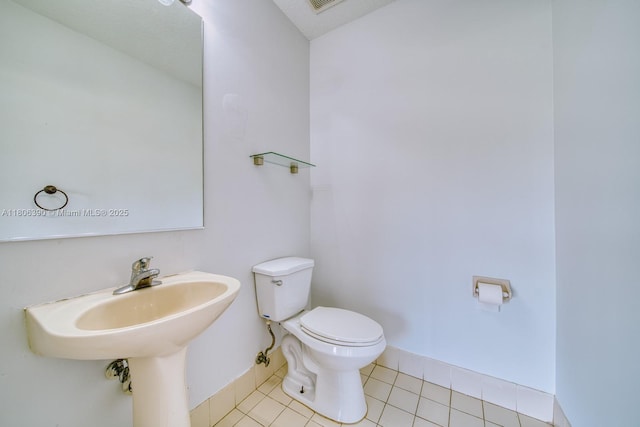 9018 SW 211th Ln, Cutler Bay, FL 33189 - half bath featuring toilet, baseboards, and tile patterned floors