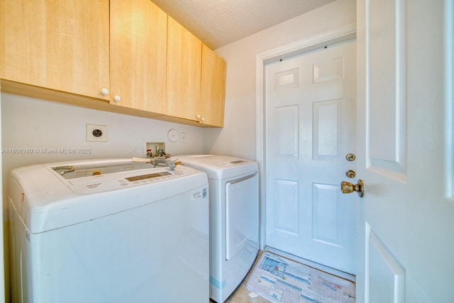 9018 SW 211th Ln, Cutler Bay, FL 33189 - laundry room with cabinet space, washing machine and dryer, and a textured ceiling