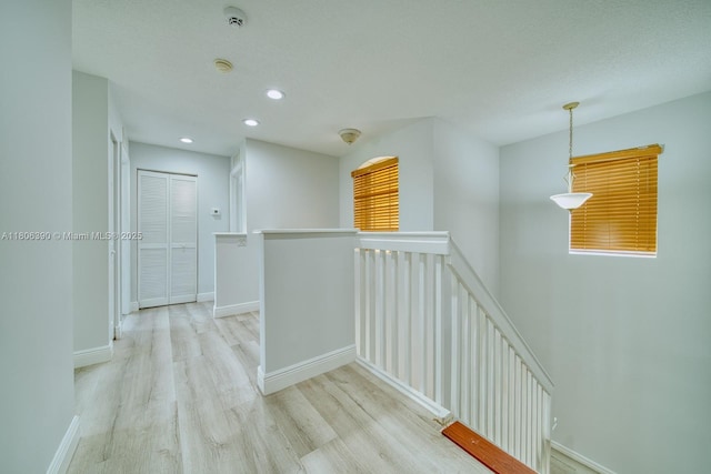 9018 SW 211th Ln, Cutler Bay, FL 33189 - hallway featuring an upstairs landing, wood finished floors, recessed lighting, and baseboards