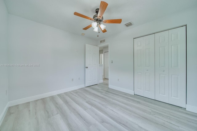 9018 SW 211th Ln, Cutler Bay, FL 33189 - unfurnished bedroom featuring light wood-type flooring, baseboards, and a closet