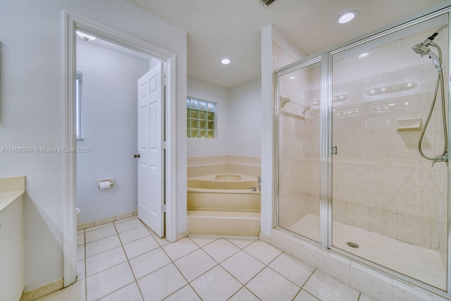 9018 SW 211th Ln, Cutler Bay, FL 33189 - full bathroom with a stall shower, tile patterned flooring, a bath, toilet, and recessed lighting