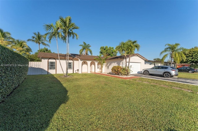 7230 SW 131st Ave, Miami, FL 33183 - ranch-style house featuring concrete driveway, an attached garage, a front yard, and stucco siding