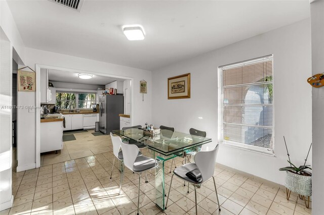 7230 SW 131st Ave, Miami, FL 33183 - dining space featuring baseboards