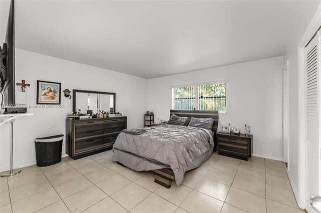 7230 SW 131st Ave, Miami, FL 33183 - bedroom with light tile patterned floors and baseboards