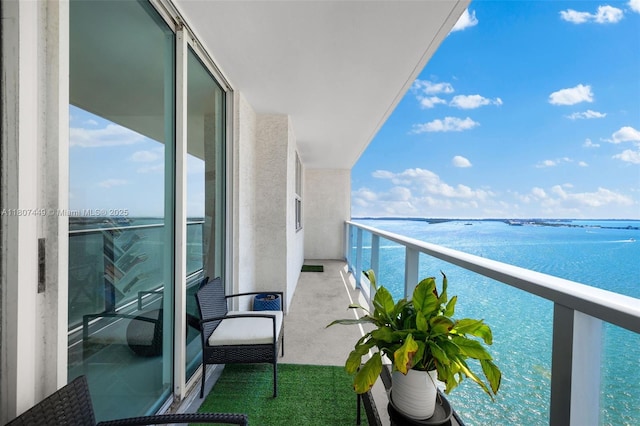 1155 Brickell Bay Dr Unit 2005, Miami, FL 33131 - balcony featuring a water view