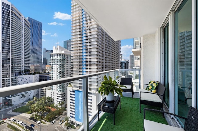 1155 Brickell Bay Dr Unit 2005, Miami, FL 33131 - balcony featuring a city view