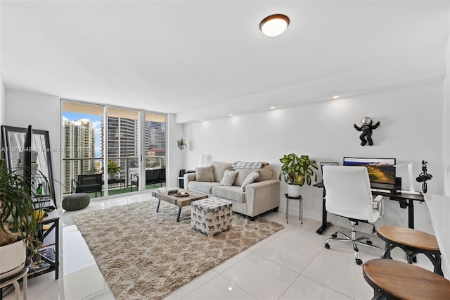 1155 Brickell Bay Dr Unit 2005, Miami, FL 33131 - living area with light tile patterned flooring, floor to ceiling windows, and a desk