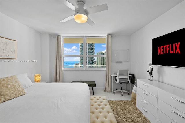 1155 Brickell Bay Dr Unit 2005, Miami, FL 33131 - bedroom with ceiling fan, tile patterned flooring, and baseboards