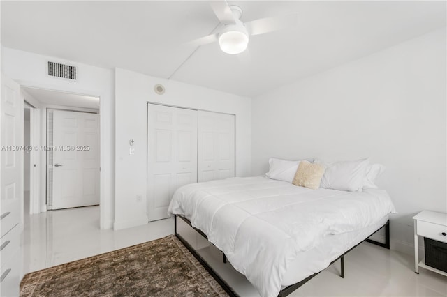 1155 Brickell Bay Dr Unit 2005, Miami, FL 33131 - bedroom featuring a closet, a ceiling fan, and baseboards