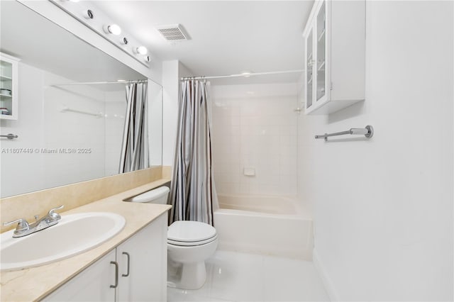 1155 Brickell Bay Dr Unit 2005, Miami, FL 33131 - bathroom with toilet, vanity, shower / bath combo, tile patterned floors, and baseboards