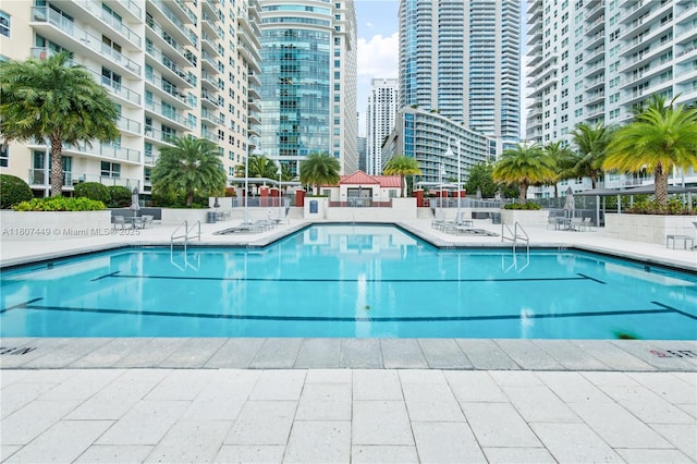 1155 Brickell Bay Dr Unit 2005, Miami, FL 33131 - community pool with a patio area and a city view