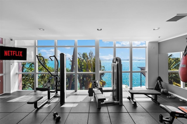 1155 Brickell Bay Dr Unit 2005, Miami, FL 33131 - exercise room with floor to ceiling windows, a water view, plenty of natural light, recessed lighting, and crown molding