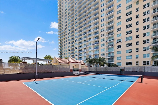 1155 Brickell Bay Dr Unit 2005, Miami, FL 33131 - view of tennis court featuring community basketball court