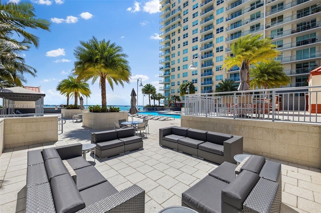 1155 Brickell Bay Dr Unit 2005, Miami, FL 33131 - view of patio with outdoor lounge area and a community pool