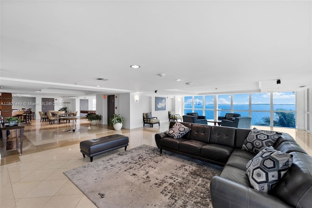 1155 Brickell Bay Dr Unit 2005, Miami, FL 33131 - living room with light tile patterned floors, a water view, and recessed lighting