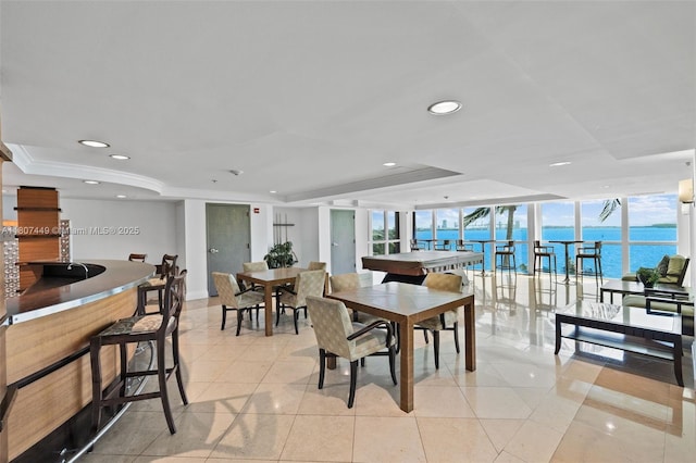1155 Brickell Bay Dr Unit 2005, Miami, FL 33131 - dining area with a wall of windows, a raised ceiling, light tile patterned floors, a water view, and recessed lighting