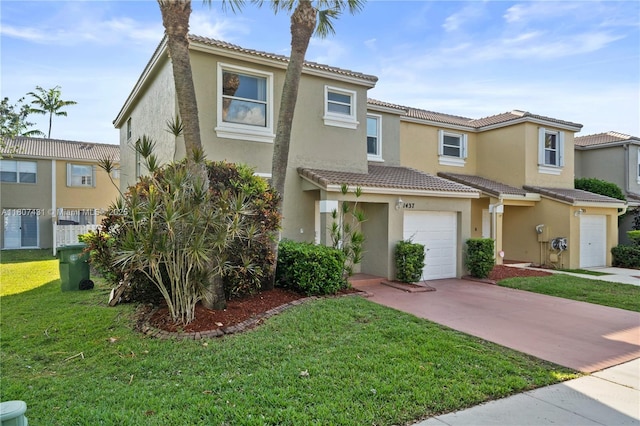 1437 NW 154th Ln, Pembroke Pines, FL 33028 - townhome / multi-family property featuring a tiled roof, an attached garage, stucco siding, concrete driveway, and a front lawn