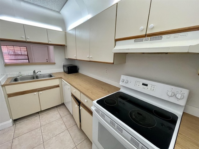 2624 Riverside Dr Unit 2624, Coral Springs, FL 33065 - kitchen with white appliances, under cabinet range hood, a sink, light countertops, and light tile patterned flooring