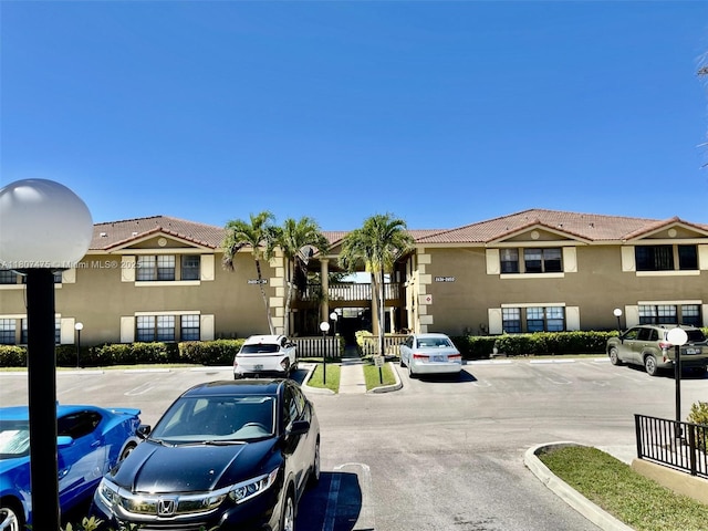 2624 Riverside Dr Unit 2624, Coral Springs, FL 33065 - view of asphalt street with curbs and sidewalks