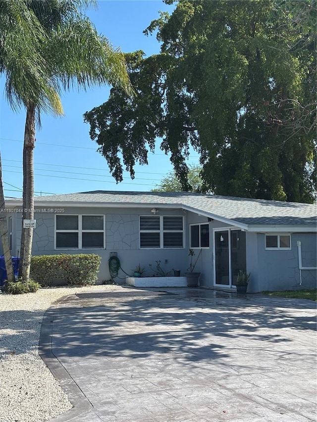 6516 Flagler St, Hollywood, FL 33023 - single story home with concrete driveway and roof with shingles