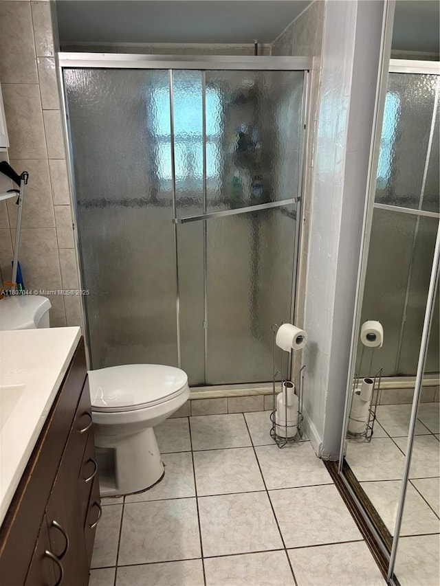 6516 Flagler St, Hollywood, FL 33023 - full bathroom with a stall shower, tile patterned flooring, and vanity