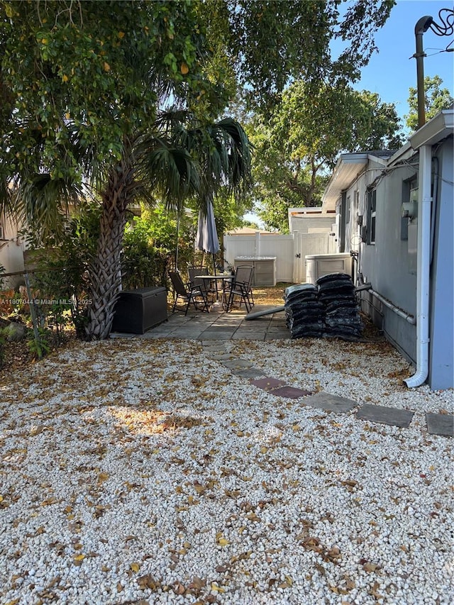 6516 Flagler St, Hollywood, FL 33023 - view of yard featuring a patio area