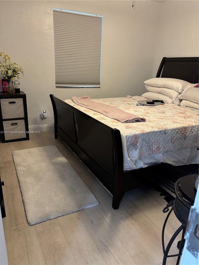 6516 Flagler St, Hollywood, FL 33023 - bedroom featuring wood finished floors and baseboards