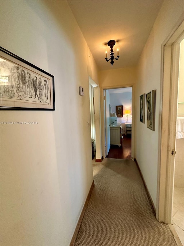 2040 N Hibiscus Dr, North Miami, FL 33181 - corridor featuring carpet floors and baseboards