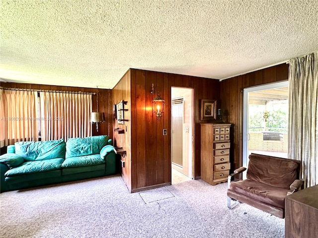 2040 N Hibiscus Dr, North Miami, FL 33181 - living area featuring carpet, wooden walls, and a textured ceiling