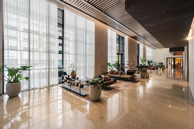 601 NE 1st Ave Unit 3507, Miami, FL 33132 - lobby with a wall of windows and a towering ceiling