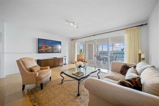 5235 Fisher Island Dr Unit 5235, Miami Beach, FL 33109 - living area featuring light tile patterned floors and rail lighting