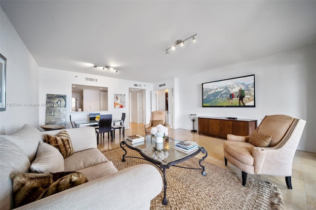 5235 Fisher Island Dr Unit 5235, Miami Beach, FL 33109 - living area featuring rail lighting and light tile patterned floors