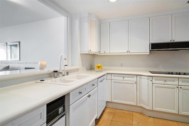 5235 Fisher Island Dr Unit 5235, Miami Beach, FL 33109 - kitchen with a sink, light tile patterned flooring, dishwashing machine, white cabinetry, and black electric stovetop