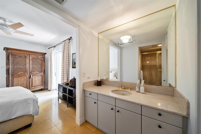 5235 Fisher Island Dr Unit 5235, Miami Beach, FL 33109 - ensuite bathroom featuring ceiling fan, tile patterned flooring, a stall shower, and vanity