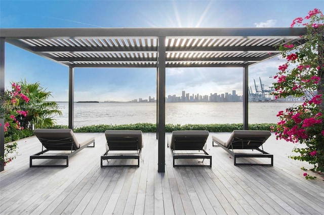 5235 Fisher Island Dr Unit 5235, Miami Beach, FL 33109 - deck with a pergola, a water view, and a skyline view