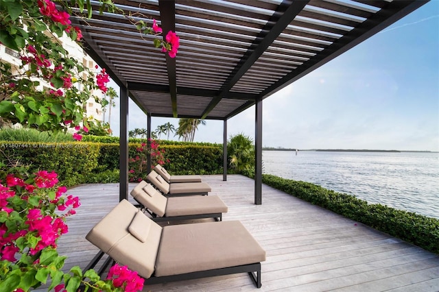 5235 Fisher Island Dr Unit 5235, Miami Beach, FL 33109 - deck with a water view and a pergola