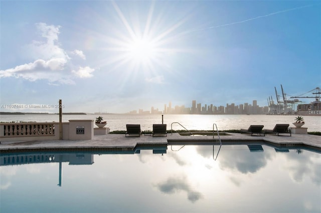 5235 Fisher Island Dr Unit 5235, Miami Beach, FL 33109 - swimming pool featuring a water view and a skyline view