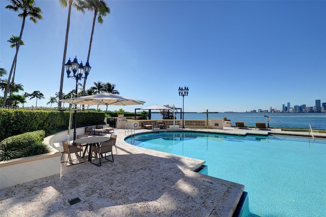 5235 Fisher Island Dr Unit 5235, Miami Beach, FL 33109 - community pool featuring a patio area