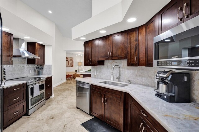 16301 SW 62nd St, Southwest Ranches, FL 33331 - kitchen featuring wall chimney exhaust hood, appliances with stainless steel finishes, a sink, backsplash, and dark brown cabinetry